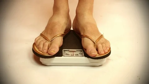 Woman on a weight. 스톡 동영상 73104040