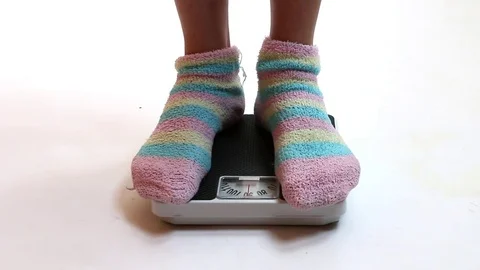 Woman on a weight. Stock Footage 73104070