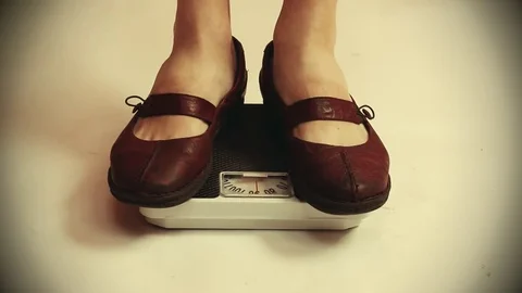 Woman on a weight. Stock Footage 73104151