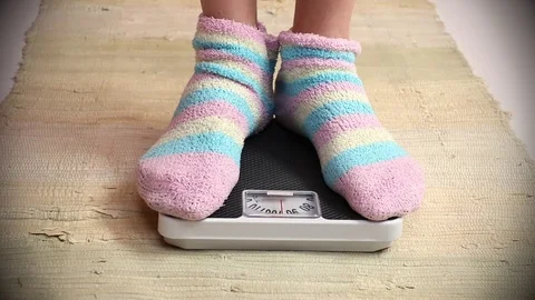 Woman on a weight. Stock Footage 73104197