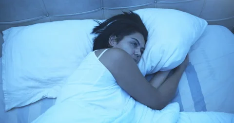 The woman who cannot sleep at night is getting bored Stock Footage