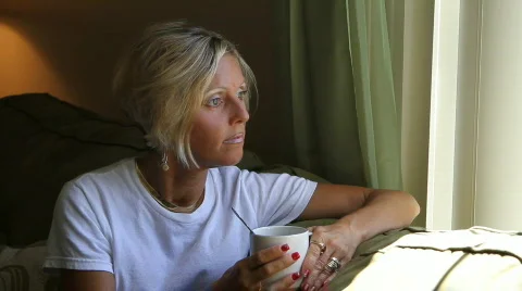 Woman By Window Light Video stock 844532