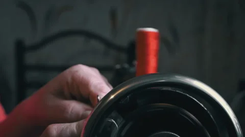 Woman Winds a Thread for Sewing on a Typewriter Close-up Stock Footage 229490986