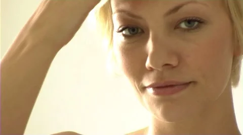 Woman winking at camera Stock Footage 43682204