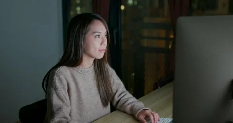 Woman work on computer at night Stock Footage 132876619