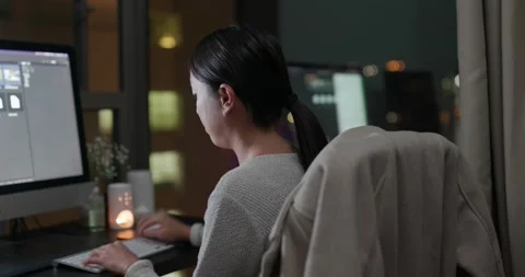 Woman work on computer at night Stock Footage 147330769