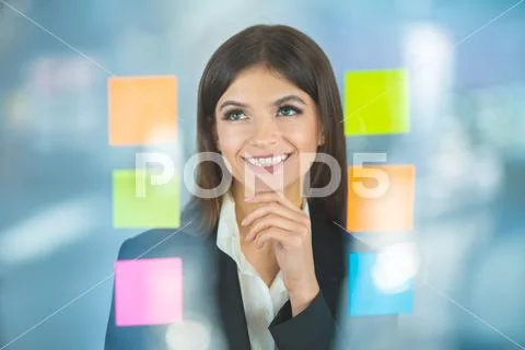 The woman work with stickers Stock Photos