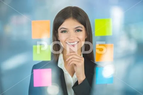 The woman work with stickers Stock Photos