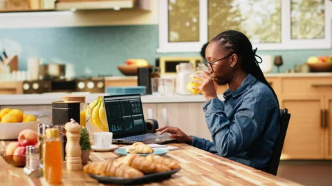 Woman worker takes analytics notes and manages projects on laptop Stock Footage 344247495