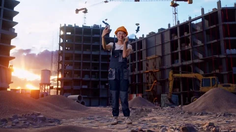 Woman Worker Using Smartphone Taking Picture At Construction Site Stock Footage 283997438
