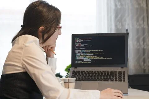 Woman Working And Programming On Computer In Office. Female Programmer Workin 스톡 사진