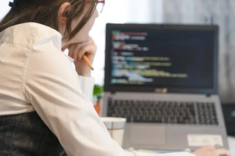Woman Working And Programming On Computer In Office.woman working on coding o Stock-Fotos