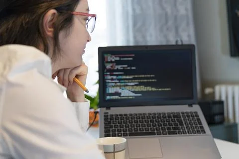 Woman Working And Programming On Computer In Office.woman working on coding o Stock Photos
