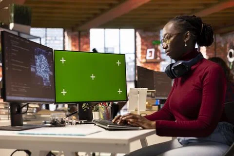 Woman working in artificial intelligence tech venture using mockup PC Stock Photos
