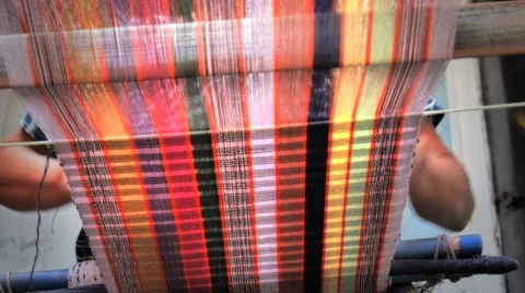 Woman working on backstrap loom Stock Footage 66458078