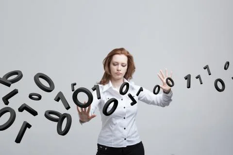 Woman working with binary code, concept of digital technology Stock Photos