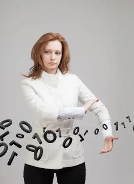 Woman working with binary code, concept of digital technology Foto stock