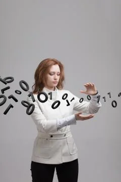Woman working with binary code, concept of digital technology 스톡 사진