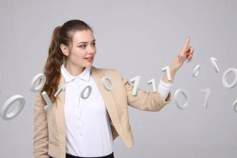 Woman working with binary code, concept of digital technology Foto stock