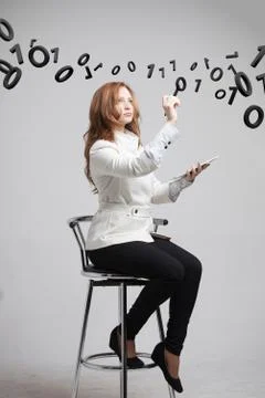 Woman working with binary code, concept of digital technology Stock Photos