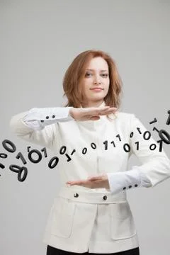 Woman working with binary code, concept of digital technology Stockfoto's