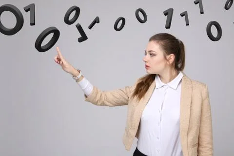 Woman working with binary code, concept of digital technology Stock Photos