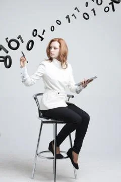 Woman working with binary code, concept of digital technology Foto stock