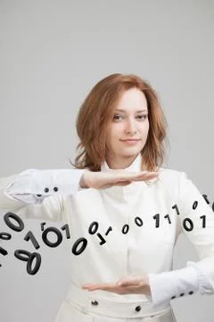 Woman working with binary code, concept of digital technology Stockfoto's