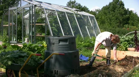 Woman working with a compost Stock Footage 487787