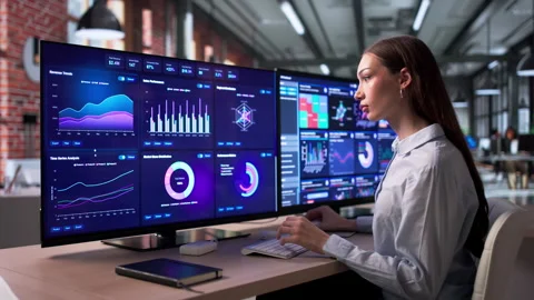 Woman Working On Computer Analyzing Business Data Dashboard Stock Footage 334927855