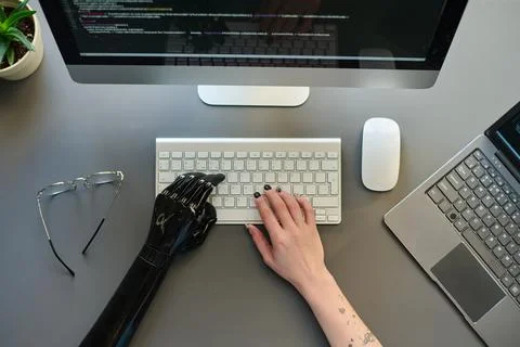 Woman working on computer with codes Stockfoto's