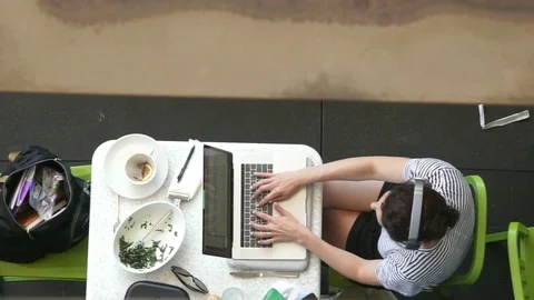 Woman Working With Computer At Dinner Table Stock Footage 94546937