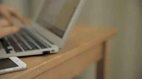 A woman is working on a computer Stock Footage 67009679