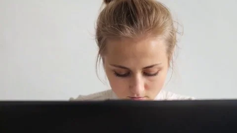 Woman working on a computer Stock Footage 69084319