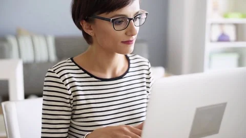 Woman working on the computer Video stock 70044887