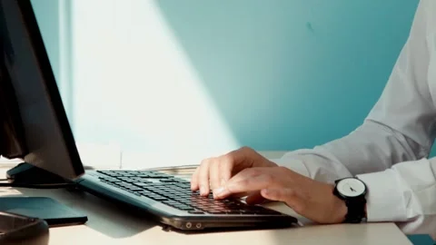 A woman working at a computer Stock Footage 100534591
