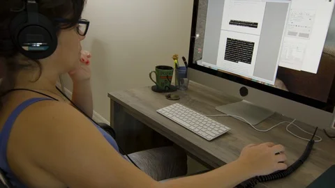 Woman working on computer at home during quarantine Stock Footage 127195484