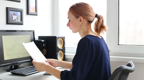 Woman working with computer in office Stock Footage 61939788