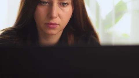 Woman working at the computer in the office Stock Footage 105192056