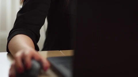 Woman working at the computer in the office Stock Footage 105192604