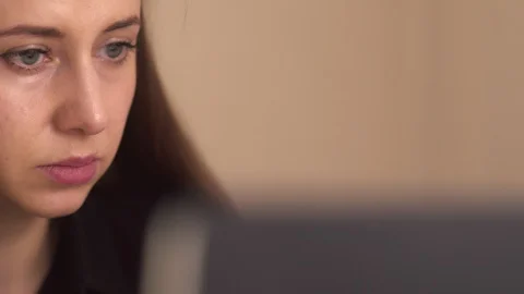Woman working at the computer in the office Stock Footage 105193265