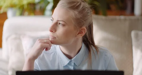 Woman working on computer thinking and solving problem Video stock 127287215