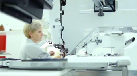 Woman working on computerized machine embroidery Stock Footage 31762151