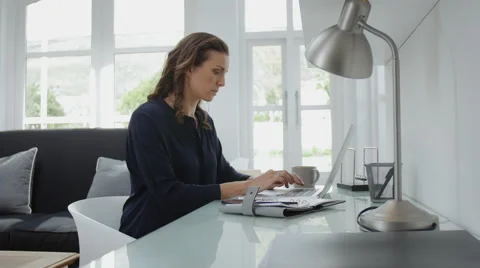 Woman working at desk Video stock 55655853
