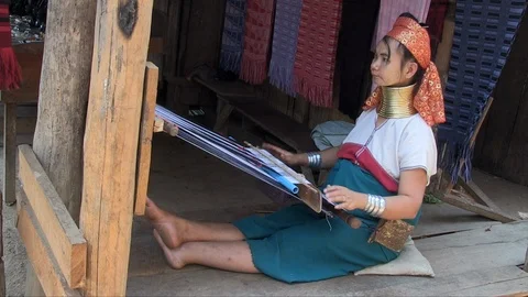 Woman working on a handloom Stock Footage 103451682