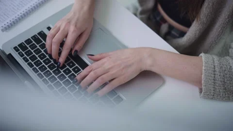 Woman working hands typing on computer Stock Footage 148029309