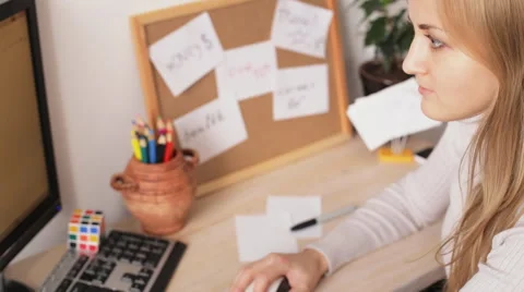 Woman working on her computer Video stock 68660543