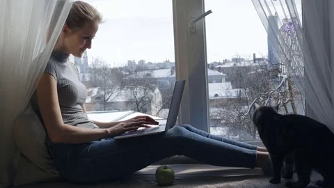 Woman working on her computer Stock Footage 75227758