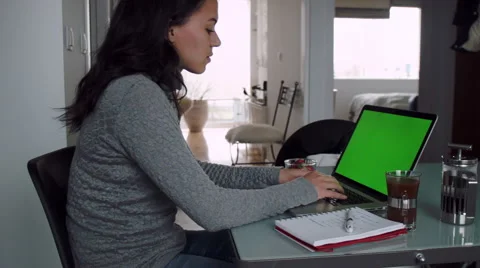 Woman working from home on computer Stock Footage 53087419
