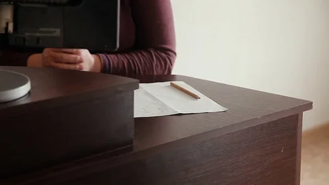 Woman working at home at the computer Stock Footage 79435833